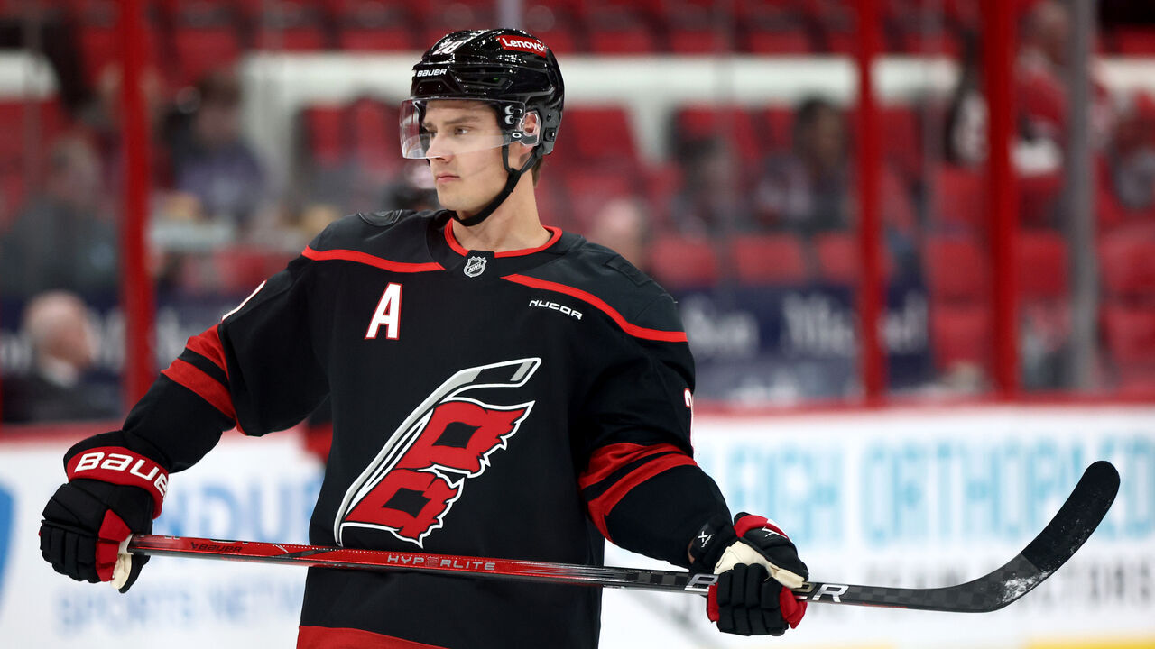 RALEIGH, NORTH CAROLINA - DECEMBER 13: Sebastian Aho #20 of the Carolina Hurricanes looks on prior to the game against the Ottawa Senators at Lenovo Center on December 13, 2024 in Raleigh, North Carolina.