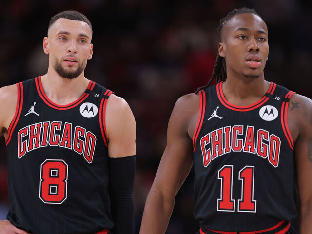 CHICAGO, IL - DECEMBER 13: Zach LaVine #8 of the Chicago Bulls and Ayo Dosunmu #11 of the Chicago Bulls looks on during the second half against the Charlotte Hornets on December 13, 2024 at the United Center in Chicago,Illinois.