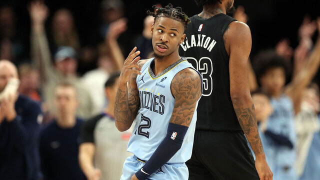 MEMPHIS, TENNESSEE - DECEMBER 13: Ja Morant #12 of the Memphis Grizzlies reacts during the first half \B at FedExForum on December 13, 2024 in Memphis, Tennessee.