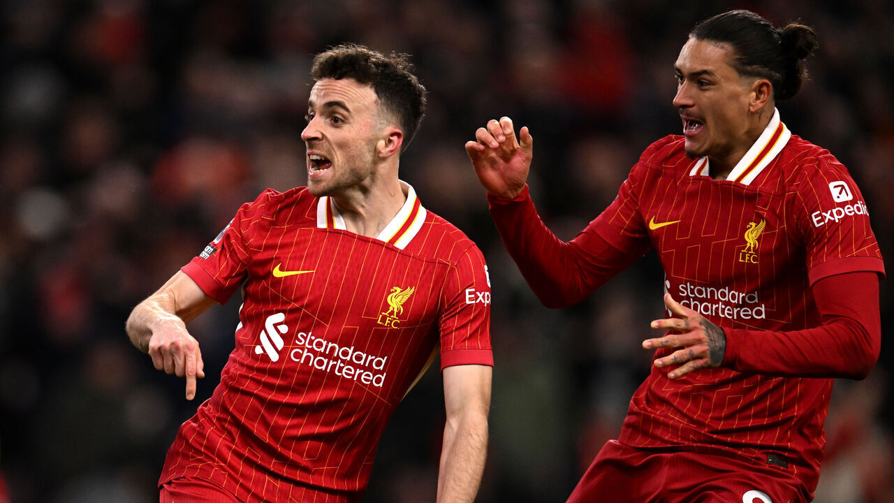 LIVERPOOL, ENGLAND - DECEMBER 14: (SUN AND SUN ON SUNDAY OUT) Diogo Jota of Liverpool celebrates scoring his team's second goal during the Premier League match between Liverpool FC and Fulham FC at Anfield on December 14, 2024 in Liverpool, England.