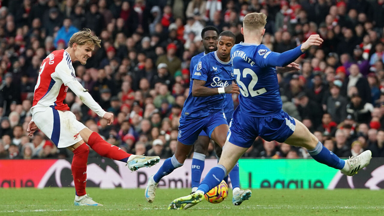 LONDON, ENGLAND - DECEMBER 14:Arsenal's Martin Odegaard has a shot on goal during the Premier League match between Arsenal FC and Everton FC at Emirates Stadium on December 14, 2024 in London, England.