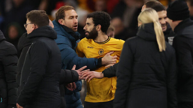 WOLVERHAMPTON, ENGLAND - DECEMBER 14: Craig Dawson of Wolverhampton Wanderers restrains Rayan Ait-Nouri of Wolverhampton Wanderers as tempers flare after the Premier League match between Wolverhampton Wanderers FC and Ipswich Town FC at Molineux on December 14, 2024 in Wolverhampton, England.