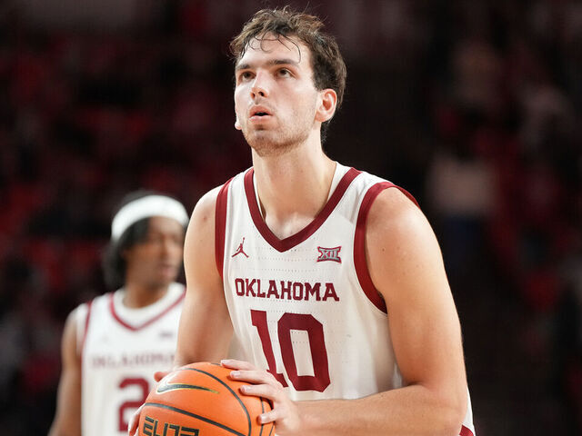 NORMAN, OK - DECEMBER 05: Sam Godwin #10 of the Oklahoma Sooners takes a foul shot during a college basketball game against the Providence Friars at Lloyd Noble Center on December 5, 2023 in Norman, Oklahoma.