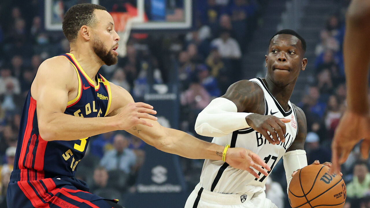 SAN FRANCISCO, CALIFORNIA - NOVEMBER 25: Dennis Schroder #17 of the Brooklyn Nets is guarded by Stephen Curry #30 of the Golden State Warriors in the first half at Chase Center on November 25, 2024 in San Francisco, California. NOTE TO USER: User expressly acknowledges and agrees that, by downloading and/or using this photograph, user is consenting to the terms and conditions of the Getty Images License Agreement.