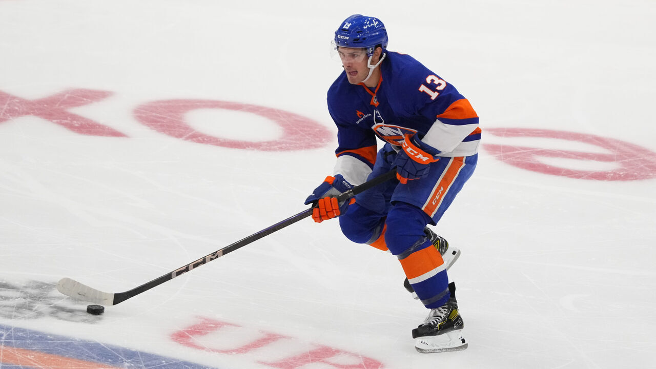 ELMONT, NY - OCTOBER 26: New York Islanders Center Mathew Barzal (13) skates with the puck during the third period of the National Hockey League game between the Florida Panthers and the New York Islanders on October 26, 2024, at UBS Arena in Elmont, NY.