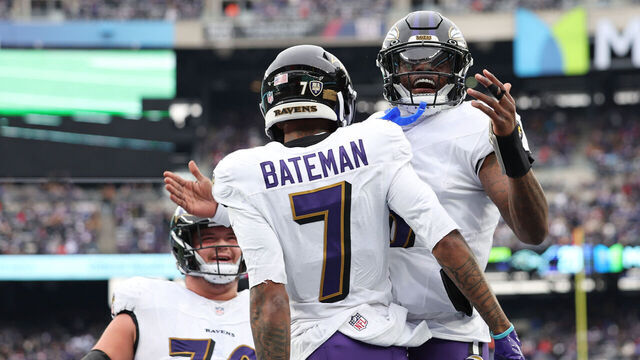 EAST RUTHERFORD, NEW JERSEY - DECEMBER 15: Rashod Bateman #7 and Lamar Jackson #8 of the Baltimore Ravens celebrate a touchdown during the second quarter of a game against the New York Giants at MetLife Stadium on December 15, 2024 in East Rutherford, New Jersey.