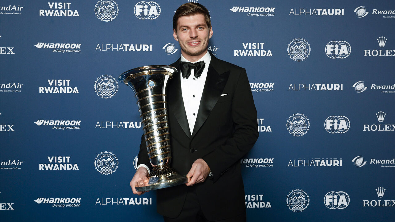 KIGALI, RWANDA - DECEMBER 13: In this handout provided by Federation Internationale de l'Automobile (FIA), F1 Champion Max Verstappen of Netherlands and Oracle Red Bull Racing poses for a photograph after winning the Formula 1 championship award during the FIA Awards 2024 on December 13, 2024 in Kigali, Rwanda.