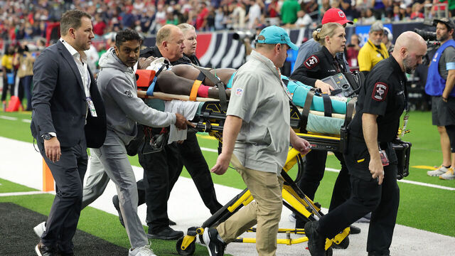 HOUSTON, TEXAS - DECEMBER 15: Grant DuBose #88 of the Miami Dolphins is stretchered off the field after an injury in the third quarter against the Houston Texans at NRG Stadium on December 15, 2024 in Houston, Texas.
