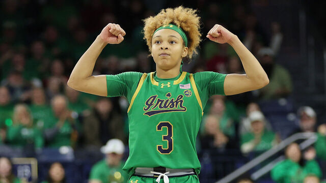 SOUTH BEND, INDIANA - DECEMBER 12: Hannah Hidalgo #3 of the Notre Dame Fighting Irish celebrates a layup by Kate Koval #13 (not pictured)against the UConn Huskies during the second half at Purcell Pavilion at the Joyce Center on December 12, 2024 in South Bend, Indiana.