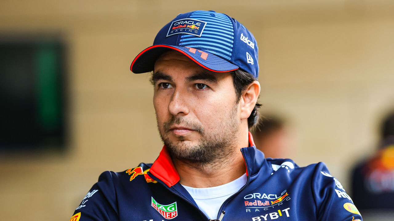 LUSAIL CITY, QATAR - DECEMBER 1: Sergio Perez of Mexico and Oracle Red Bull Racing looks on in the paddock during the F1 Grand Prix of Qatar at Lusail International Circuit on December 1, 2024 in Lusail City, Qatar.