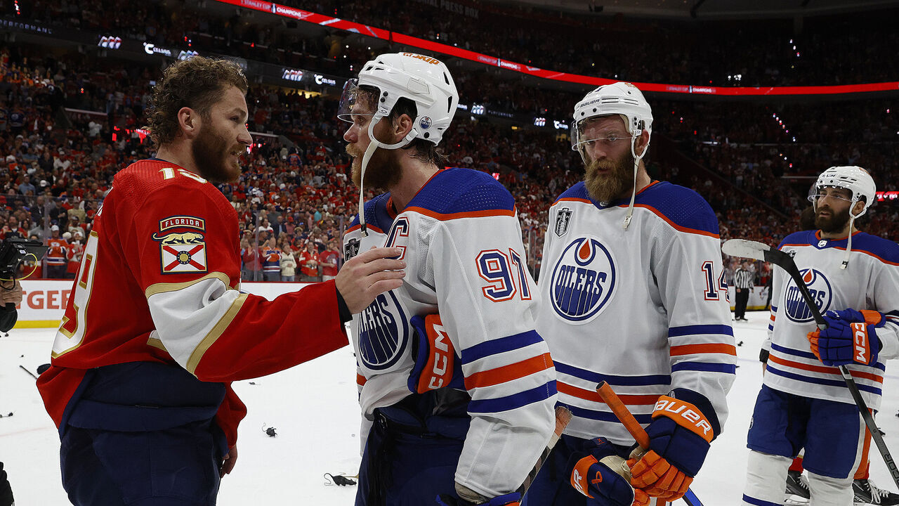 SUNRISE, FLORIDA - JUNE 24: Connor McDavid #97 of the Edmonton Oilers congratulates Matthew Tkachuk #19 of the Florida Panthers after their 2-1 win in Game Seven of the Stanley Cup Final at the Amerant Bank Arena on June 24, 2024 in Sunrise, Florida.