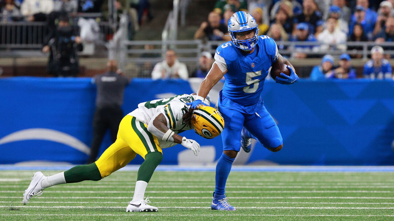 DETROIT,MICHIGAN-December 5: Detroit Lions running back David Montgomery #5 carries the ball during the first half of an NFL football game between the Green Bay Packers and the Detroit Lions at Ford Field in Detroit, Michigan USA, on Thursday, December 5, 2024.