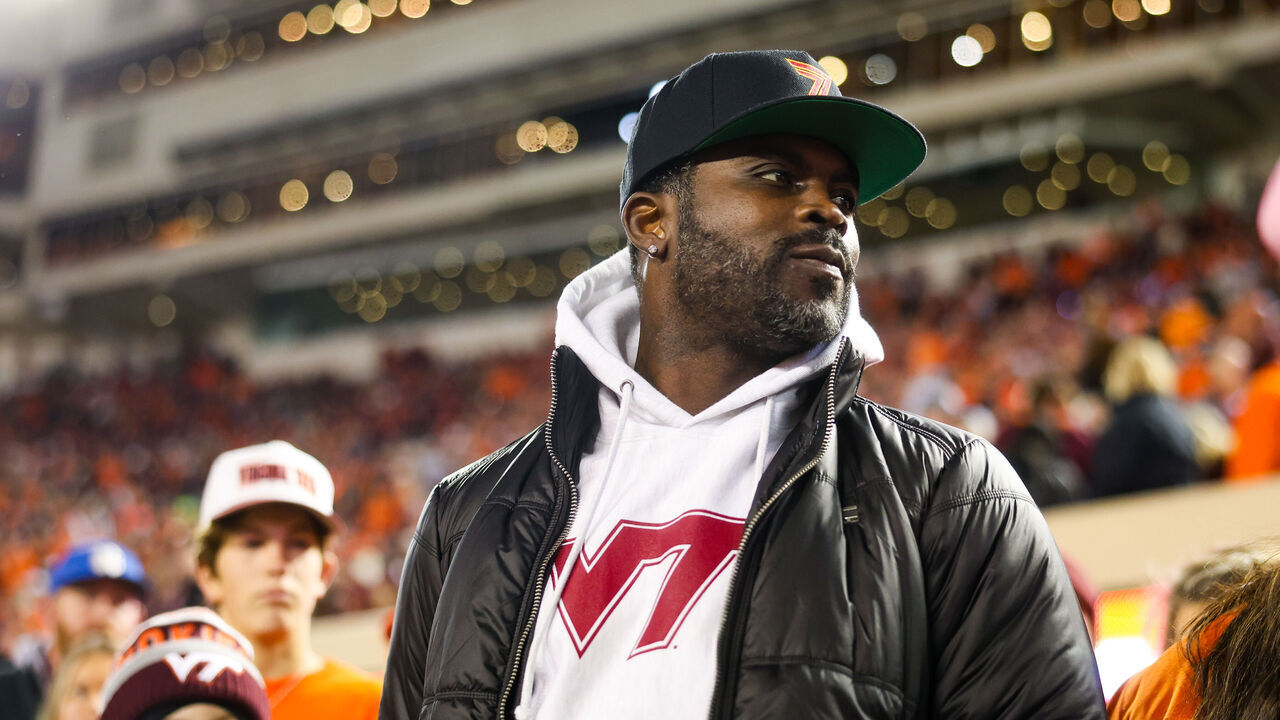 BLACKSBURG, VIRGINIA - OCTOBER 17: Michael Vick looks on prior to a game between the Virginia Tech Hokies and the Boston College Eagles at Lane Stadium on October 17, 2024 in Blacksburg, Virginia.