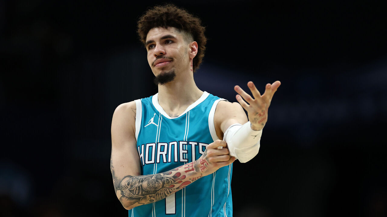 CHARLOTTE, NORTH CAROLINA - DECEMBER 16: LaMelo Ball #1 of the Charlotte Hornets reacts during the second half of the game against the Philadelphia 76ers at Spectrum Center on December 16, 2024 in Charlotte, North Carolina.