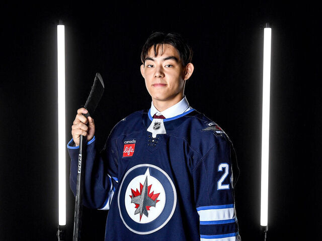 LAS VEGAS, NEVADA - JUNE 29: Kevin He poses for a portrait after being drafted by the Winnipeg Jets with the 109th overall pick in the 2024 Upper Deck NHL Draft at Sphere on June 29, 2024 in Las Vegas, Nevada.
