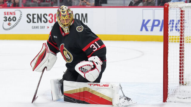 OTTAWA, CANADA - NOVEMBER 25: Anton Forsberg #31 of the Ottawa Senators skates against the Calgary Flames at Canadian Tire Centre on November 25, 2024 in Ottawa, Ontario, Canada.