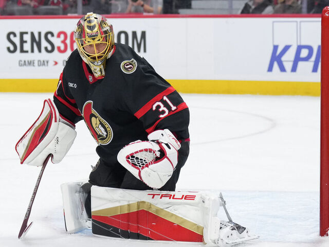 OTTAWA, CANADA - NOVEMBER 25: Anton Forsberg #31 of the Ottawa Senators skates against the Calgary Flames at Canadian Tire Centre on November 25, 2024 in Ottawa, Ontario, Canada.