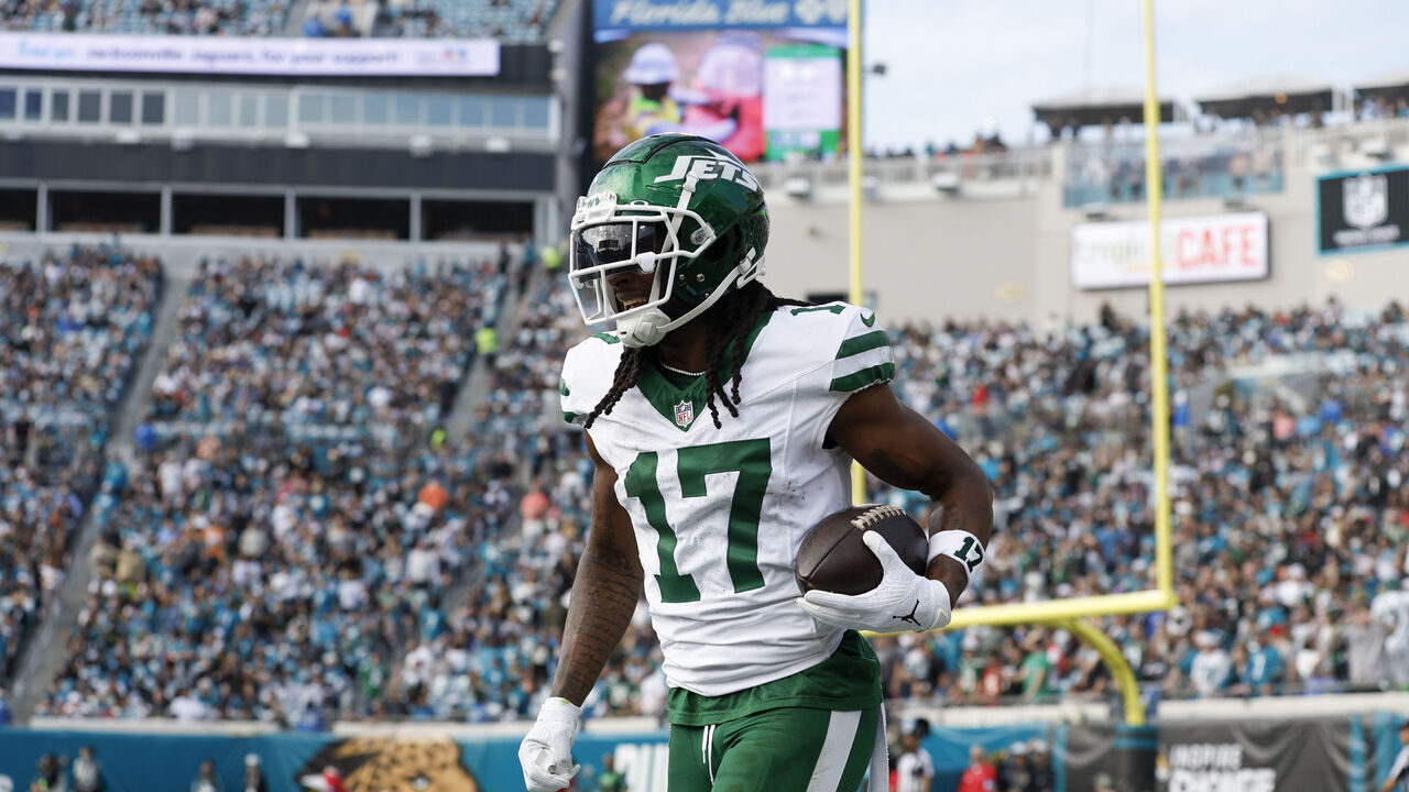 JACKSONVILLE, FL - DECEMBER 15: New York Jets wide receiver Davante Adams (17) celebrates his 100th career touchdown during the game between the Jacksonville Jaguars and the New York Jets on December 15, 2024 at EverBank Stadium in Jacksonville, Fl.