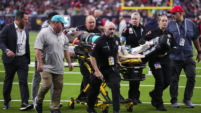 HOUSTON, TX - DECEMBER 15: Grant DuBose #88 of the Miami Dolphins is carted off of the field during an NFL football game against the Houston Texans at NRG Stadium on December 15, 2024 in Houston, Texas.