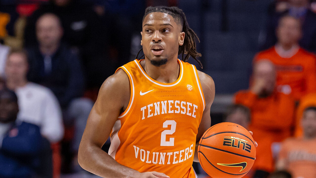 CHAMPAIGN, ILLINOIS - DECEMBER 14: Chaz Lanier #2 of the Tennessee Volunteers brings the ball up court during the game against the Illinois Fighting Illini at State Farm Center on December 14, 2024 in Champaign, Illinois.