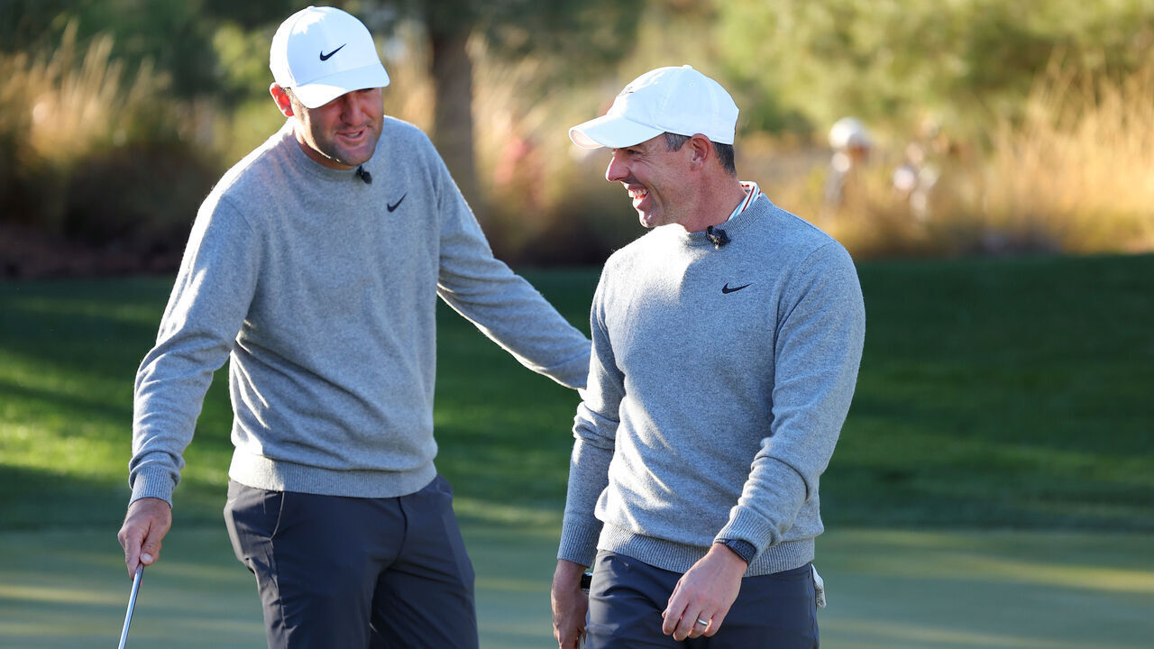 LAS VEGAS, NEVADA - DECEMBER 17: Scottie Scheffler (L) and Rory McIlroy of the PGA Tour talk during The Showdown: McIlroy and Scheffler v DeChambeau and Koepka at Shadow Creek Golf Course on December 17, 2024 in Las Vegas, Nevada.