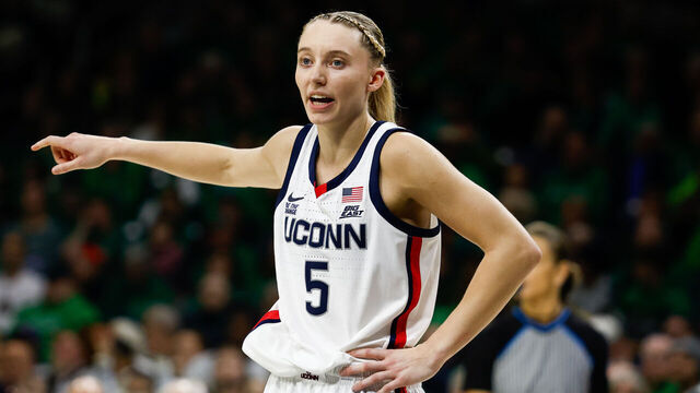 SOUTH BEND, IN - DECEMBER 12: Paige Bueckers #5 of UConn Huskies directs her teammate during a game between Connecticut and Notre Dame at Purcell Pavillion at the Joyce Center on December 12, 2024 in South Bend, Indiana.