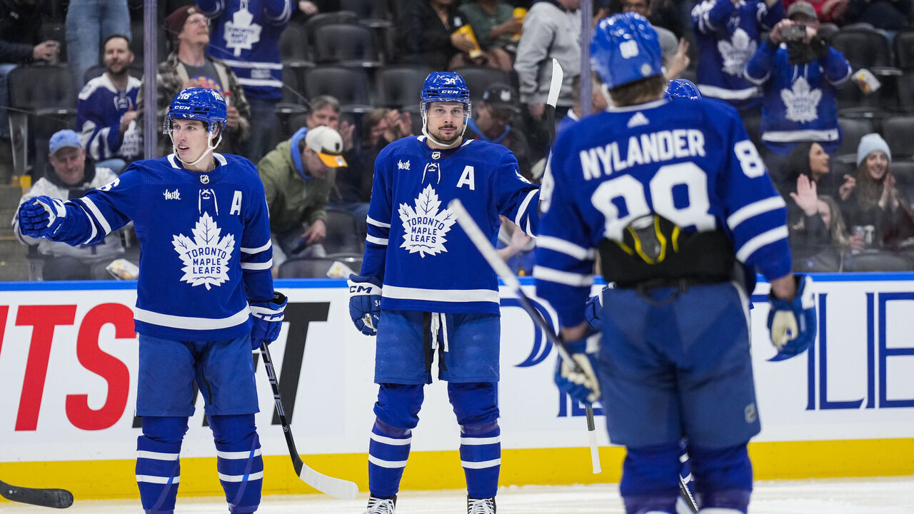 TORONTO, ON - FEBRUARY 17: Auston Matthews #34 of the Toronto Maple Leafs celebrates his second goal of the game against the Anaheim Ducks with teammates Mitchell Marner #16 and William Nylander #88 during the second period at Scotiabank Arena on February 17, 2024 in Toronto, Ontario, Canada.