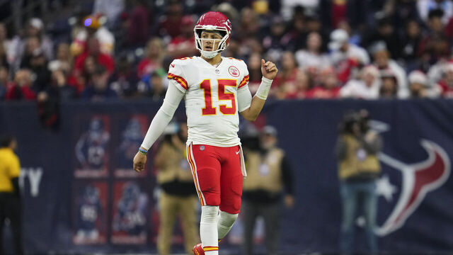 HOUSTON, TX - DECEMBER 18: Patrick Mahomes #15 of the Kansas City Chiefs looks down field against the Houston Texans at NRG Stadium on December 18, 2022 in Houston, Texas.