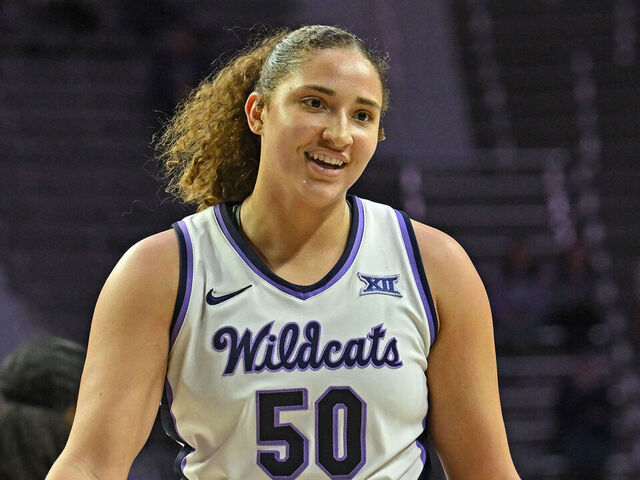 MANHATTAN, KS - DECEMBER 01: Ayoka Lee #50 of the Kansas State Wildcats celebrates with teammate Imani Lester #32 after scoring a basket in the second half against the Central Arkansas Bears at Bramlage Coliseum on December 1, 2024 in Manhattan, Kansas.