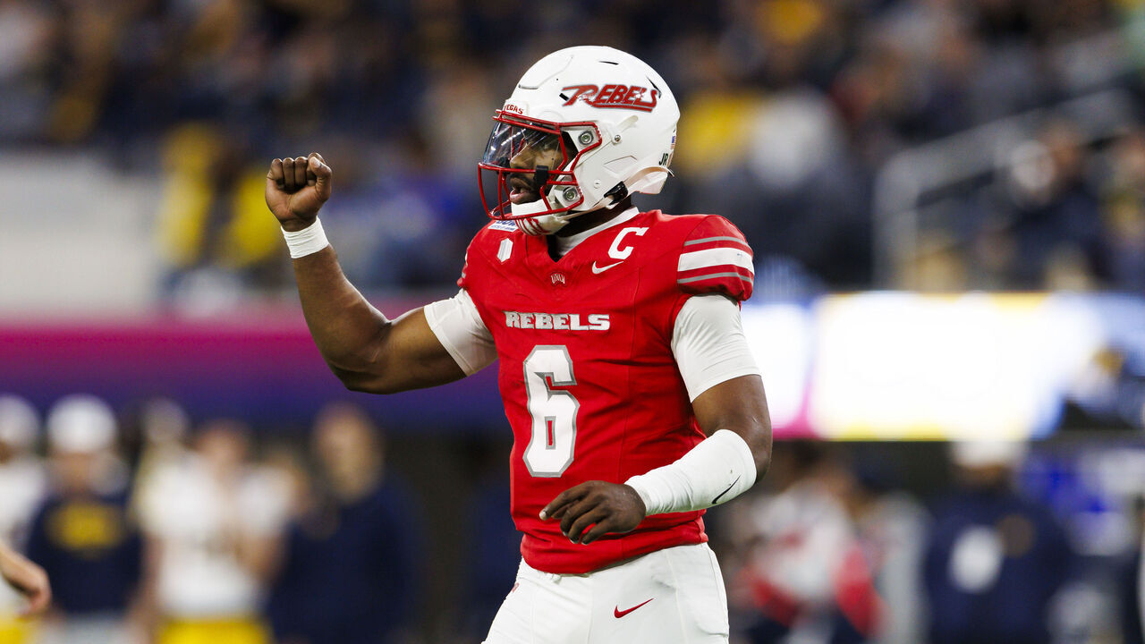 INGLEWOOD, CALIFORNIA - DECEMBER 18: Hajj-Malik Williams #6 of the UNLV Rebels celebrates a touchdown during the first half against UNLV Rebels at SoFi Stadium on December 18, 2024 in Inglewood, California.