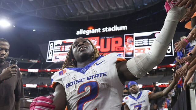 LAS VEGAS, NEVADA - OCTOBER 25: Ashton Jeanty #2 of the Boise State Broncos high fives fans after his team's victory against the UNLV Rebels at Allegiant Stadium on October 25, 2024 in Las Vegas, Nevada. Boise State won 29-24.