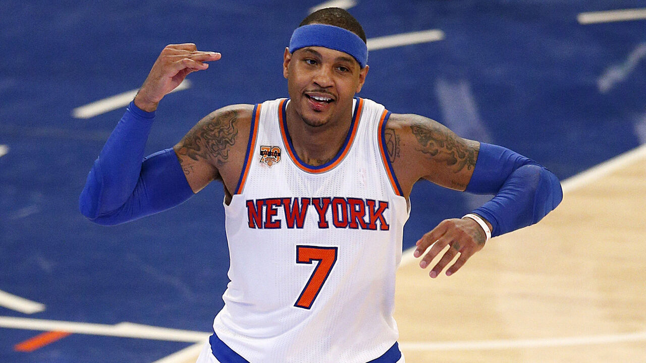 NEW YORK, NY - DECEMBER 4: Carmelo Anthony #7 of the New York Knicks celebrates scoring a 3 point shot in an NBA basketball game against the Sacramento Kings on December 4, 2016 at Madison Square Garden in New York City. Knicks won 106-98. NOTE TO USER: User expressly acknowledges and agrees that, by downloading and/or using this Photograph, user is consenting to the terms and conditions of the Getty Images License Agreement.