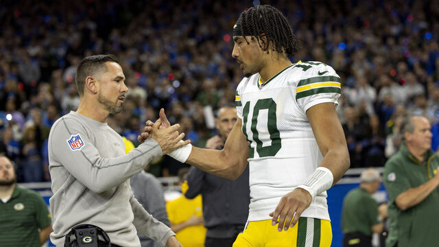 DETROIT, MICHIGAN - DECEMBER 5: Green Bay Packers head coach Matt LaFleur and Jordan Love #10 high five before the game against the Detroit Lions at Ford Field on December 5, 2024 in Detroit, Michigan. The Lions beat the Packers 34-31.