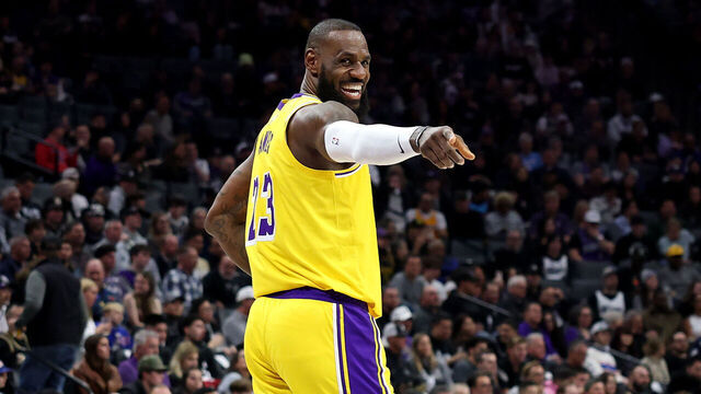 SACRAMENTO, CALIFORNIA - DECEMBER 19: LeBron James #23 of the Los Angeles Lakers points back to the Sacramento Kings' bench in the first half at Golden 1 Center on December 19, 2024 in Sacramento, California. NOTE TO USER: User expressly acknowledges and agrees that, by downloading and/or using this photograph, user is consenting to the terms and conditions of the Getty Images License Agreement.