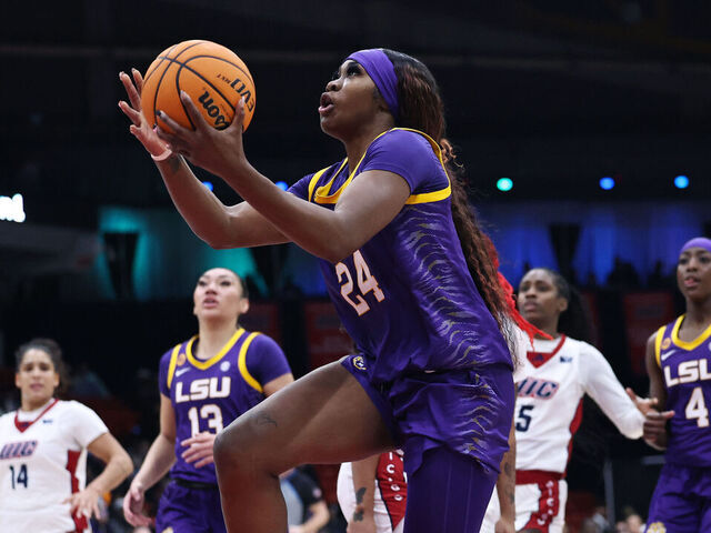 CHICAGO, ILLINOIS - DECEMBER 19: Aneesah Morrow #24 of the LSU Lady Tigers lays the ball up during the third quarter against the UIC Flames at Credit Union 1 Arena on December 19, 2024 in Chicago, Illinois.
