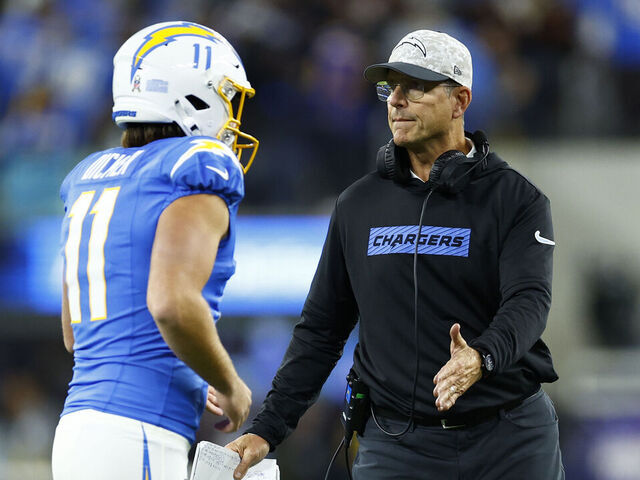 INGLEWOOD, CALIFORNIA - NOVEMBER 17: Head coach Jim Harbaugh of the Los Angeles Chargers congratulates Cameron Dicker #11 after his successful field goal against the Cincinnati Bengals during the second quarter at SoFi Stadium on November 17, 2024 in Inglewood, California.