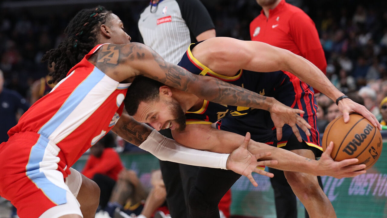 MEMPHIS, TENNESSEE - DECEMBER 19: Stephen Curry #30 of the Golden State Warriors handles the ball against Ja Morant #12 of the Memphis Grizzlies during the first half at FedExForum on December 19, 2024 in Memphis, Tennessee.