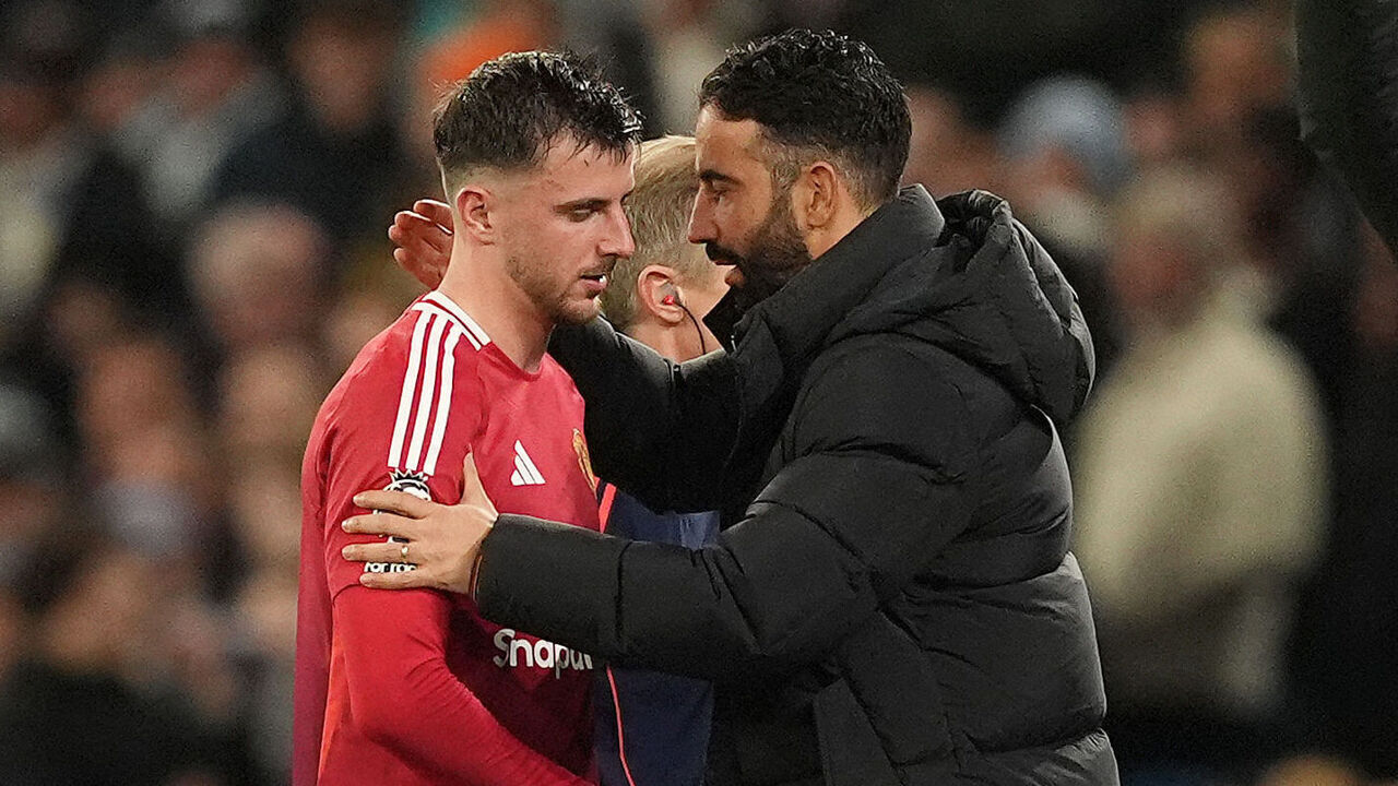 Manchester United's Mason Mount (left) is embraced by manager Ruben Amorim as he leaves the pitch after going down injured during the Premier League match at the Etihad Stadium, Manchester. Picture date: Sunday December 15, 2024.