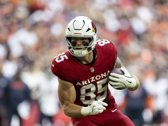 GLENDALE, ARIZONA - NOVEMBER 3: Trey McBride #85 of the Arizona Cardinals runs wit the ball and scores a touchdown during an NFL Football game against the Chicago Bears at on November 03, 2024 in Glendale, Arizona.