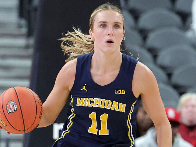 LAS VEGAS, NEVADA - NOVEMBER 04: Greta Kampschroeder #11 of the Michigan Wolverines brings the ball up the court against the South Carolina Gamecocks in the first quarter of their game during the Naismith Basketball Hall of Fame Series at T-Mobile Arena on November 04, 2024 in Las Vegas, Nevada. The Gamecocks defeated the Wolverines 68-62.