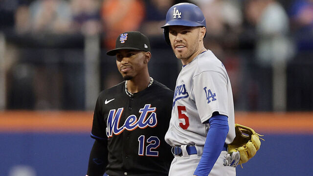 NEW YORK, NEW YORK - JULY 14: Francisco Lindor #12 of the New York Mets greets Freddie Freeman #5 of the Los Angeles Dodgers at second base during the first inning at Citi Field on July 14, 2023 in New York City.
