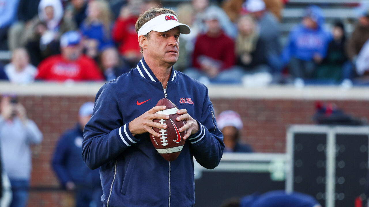 OXFORD, MISSISSIPPI - NOVEMBER 29: Lane Kiffin head coach of the Mississippi Rebels looks on during warm ups prior to the game against the Mississippi State Bulldogs at Vaught-Hemingway Stadium on November 29, 2024 in Oxford, Mississippi.