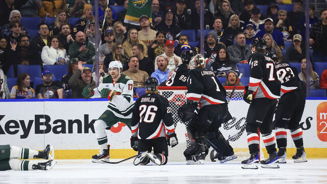 BUFFALO, NY - JANUARY 7: Marcus Foligno #17 of the Minnesota Wild scores during the third period against the Buffalo Sabres during an NHL game on January 7, 2023 at KeyBank Center in Buffalo, New York.