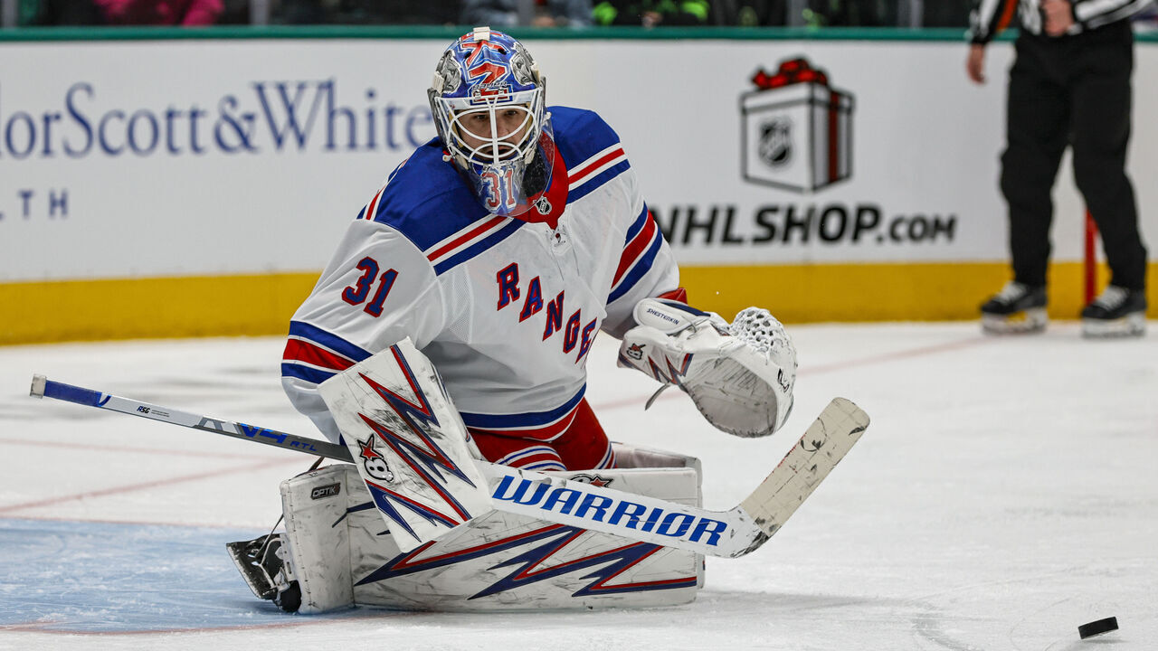 DALLAS, TX - DECEMBER 20: New York Rangers goaltender Igor Shesterkin (31) blocks a shot during the game between the Dallas Stars and the New York Rangers on December 20, 2024 at American Airlines Center in Dallas, Texas.