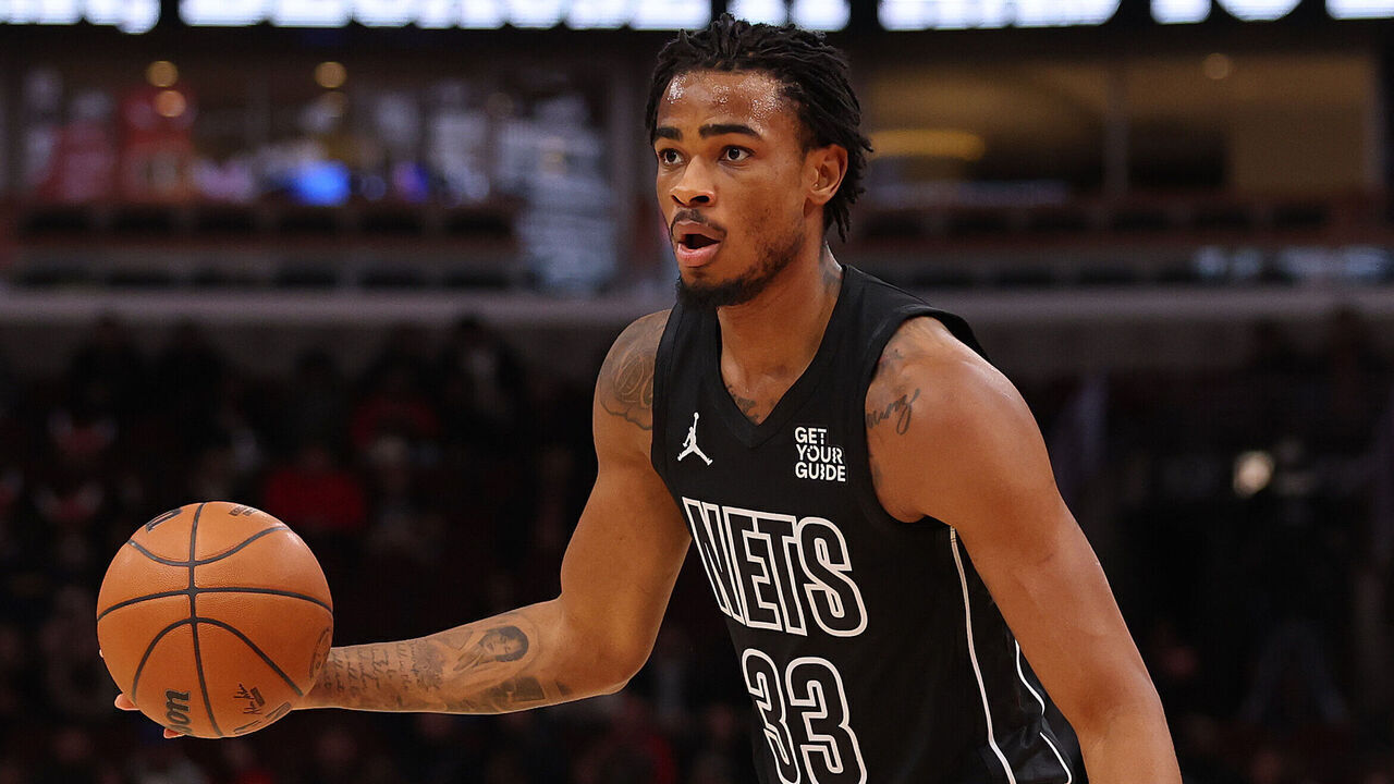 CHICAGO, ILLINOIS - DECEMBER 02: Nic Claxton #33 of the Brooklyn Nets dribbles against the Chicago Bulls during the first half at the United Center on December 02, 2024 in Chicago, Illinois.