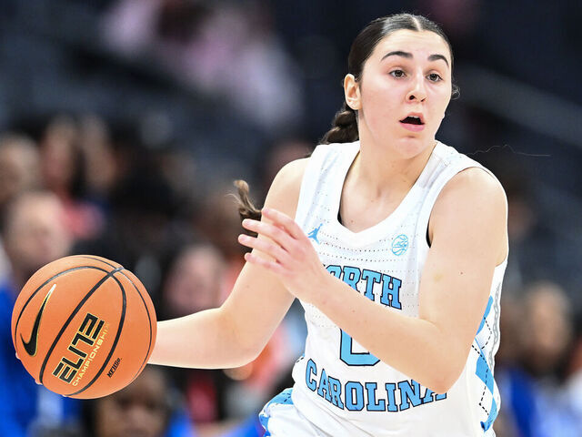 CHARLOTTE, NORTH CAROLINA - DECEMBER 18: Lanie Grant #0 of the North Carolina Tar Heels brings the ball up court in the second half of her game against the Florida Gators during the Jumpman Invitational at Spectrum Center on December 18, 2024 in Charlotte, North Carolina.
