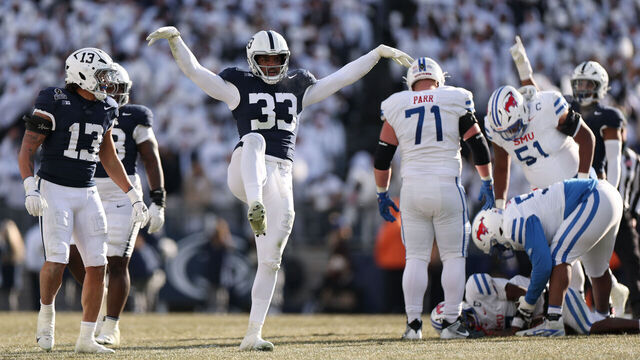 STATE COLLEGE, PENNSYLVANIA - DECEMBER 21: Dani Dennis-Sutton #33 of the Penn State Nittany Lions celebrates after a sack during the second quarter against the Southern Methodist Mustangs in the Playoff First Round Game at Beaver Stadium on December 21, 2024 in State College, Pennsylvania.