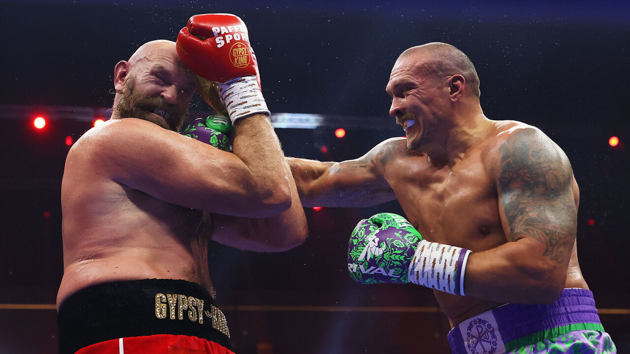 RIYADH, SAUDI ARABIA - DECEMBER 21: Oleksandr Usyk punches Tyson Fury during the IBF, IBO, WBA, WBC and WBO Undisputed World Heavyweight titles' fight between Oleksandr Usyk and Tyson Fury as part of Oleksandr Usyk v Tyson Fury 2, Reignited card at Kingdom Arena on December 21, 2024 in Riyadh, Saudi Arabia.