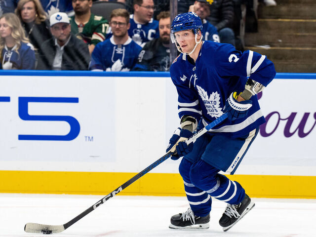 TORONTO, ON - OCTOBER 14: John Klingberg #3 of the Toronto Maple Leafs skates with the puck against the Minnesota Wild during the third period at the Scotiabank Arena on October 14, 2023 in Toronto, Ontario, Canada.