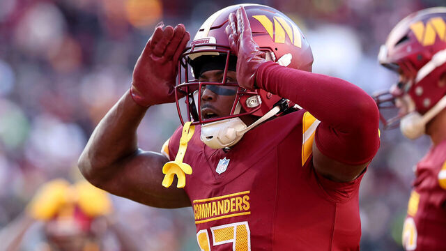 LANDOVER, MARYLAND - DECEMBER 22: Terry McLaurin #17 of the Washington Commanders celebrates after a touchdown reception against the Philadelphia Eagles during the second quarter at Northwest Stadium on December 22, 2024 in Landover, Maryland.